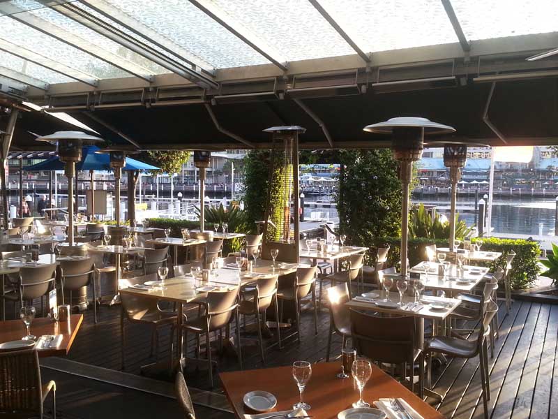 Restaurant with retractable awnings