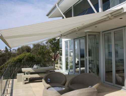 White retractable awning for modern outdoor balcony