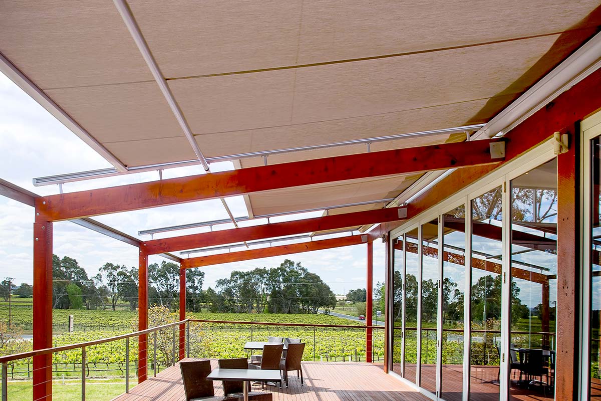 Retractable sunroof adding shade above seating area
